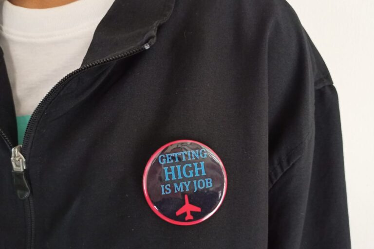 Image of Pin Badge 'Getting High is my Job' Blue on Jacket