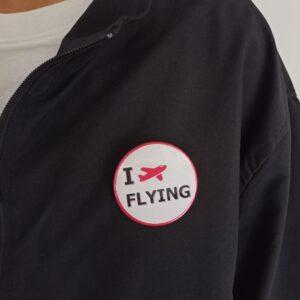 Image of Pin Badge 'I Love Flying' White on Jacket