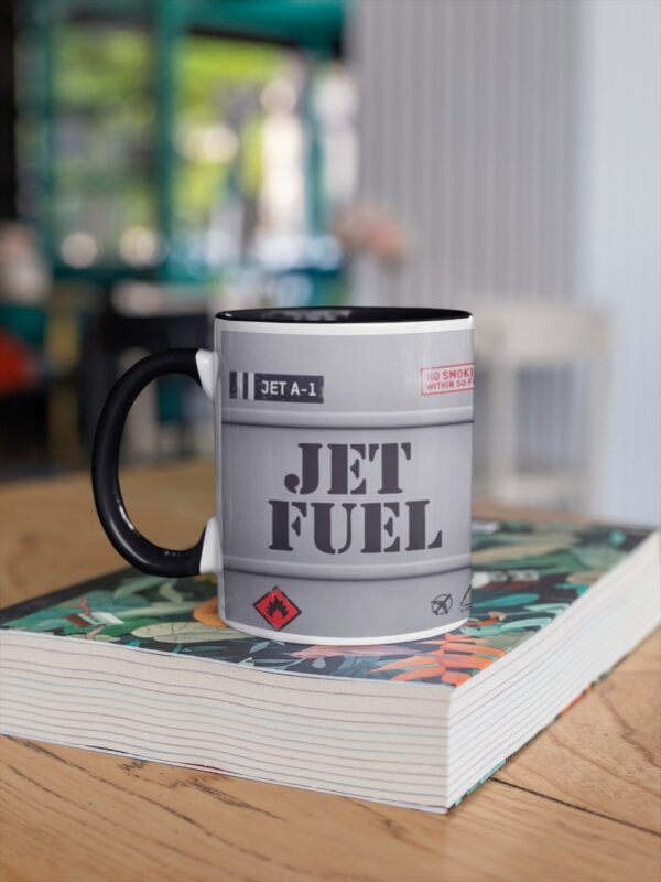 Image of Ceramic Mug Jet Fuel placed on Book