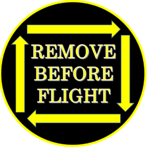 Image of Pin Badge 'Remove Before Flight' Black Yellow with Arrows