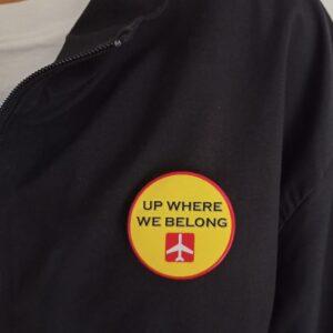 Image of Pin Badge 'Up Where We Belong' on Jacket