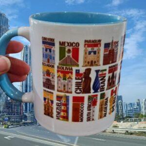 Ceramic Mug with Tourist Flags of Various Countries Light Blue Street Background