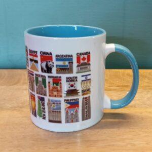 Image of Ceramic Mug with Tourist Flags of Various Countries Light Blue